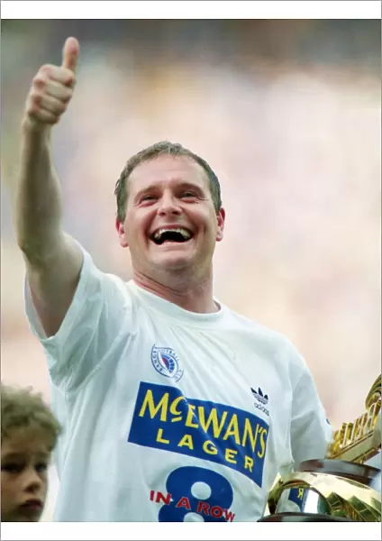 Paul Gascoigne celebrates winning the league title for Rangers in 1996