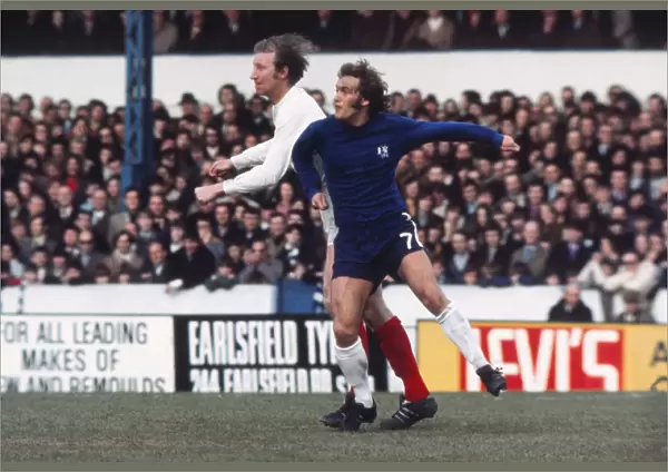 Jack Charlton of Leeds and Tommy Baldwin of Chelsea challenge for the ball