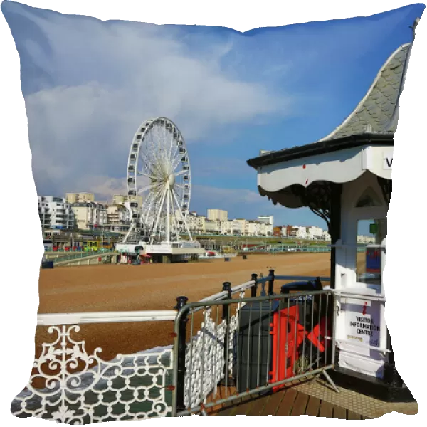 Brighton Pier and Ferris Wheel beside the beach, England, UK