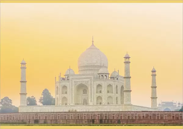 India, Uttar Pradesh, Agra, Taj Mahal in golden dawn light