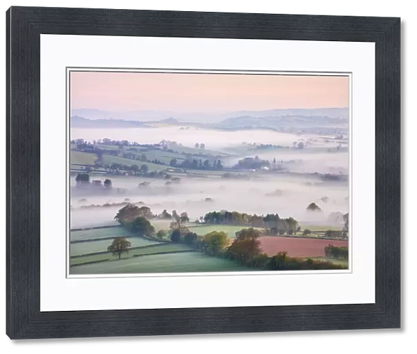 Mist covered countryside at dawn near Pennorth, Brecon Beacons National Park, Powys, Wales