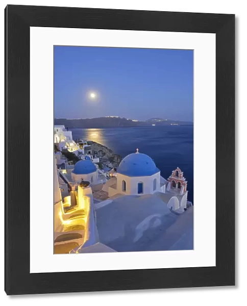 Moon over the town of Oia, Santorini, Kyclades, South Aegean, Greece, Europe