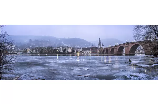 Frozen Neckar river and old town of Heidelberg in winter, Baden-Wurttemberg, Germany