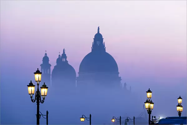 Santa Maria della Salute church in the mist; Venice, Veneto, Italy
