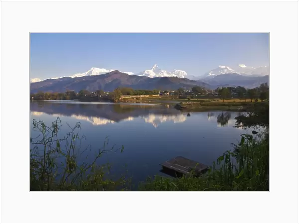 Nepal, Pokhara, Annapurna range reflecting in Phewa Lake