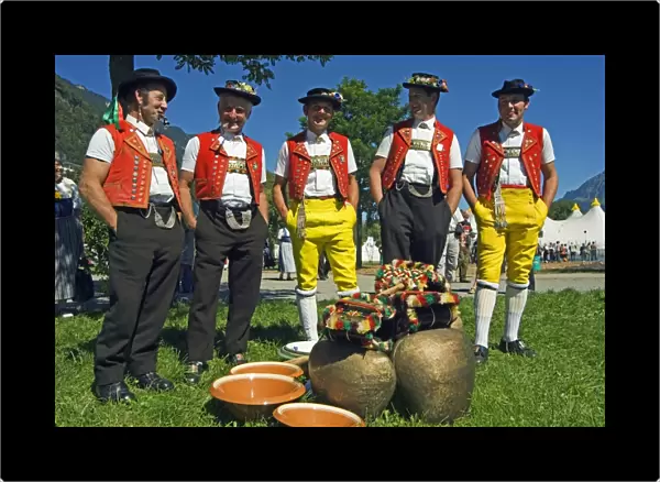 Cowbell ringers in Traditional Alpine Costume at the