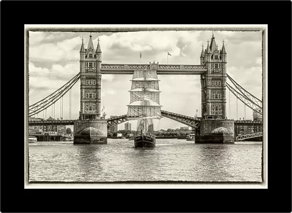 Tall Ship Thalassa passing through the Tower Bridge, London, England