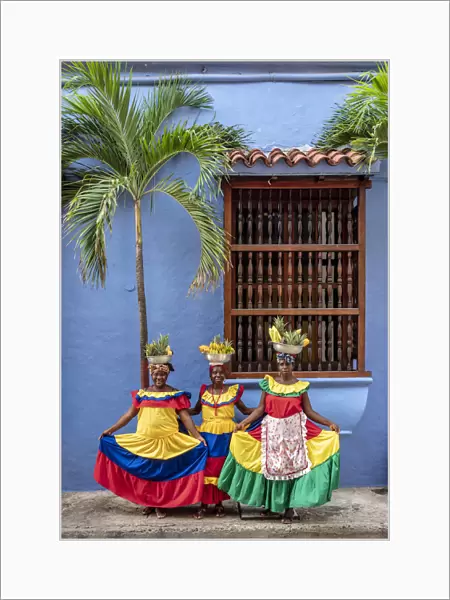 Colourful Palenqueras selling fruits on the street of Cartagena, Bolivar Department