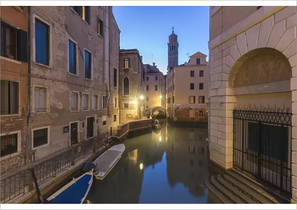 A venetian water canal at dusk, Venice, Veneto, Italy