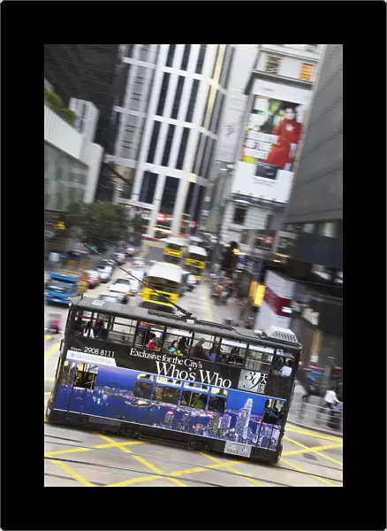 Tram passing along Des Voeux Road Central, Central, Hong Kong, China
