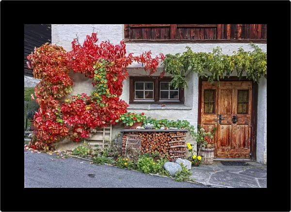 Autumn facade of a house, Coltura, Stampa, Maloja region, Canton of Graubunden, Bregaglia