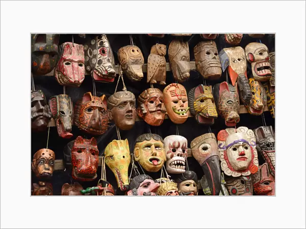 Carved masks for sale in Chichicastenango, Guatemala, Central America