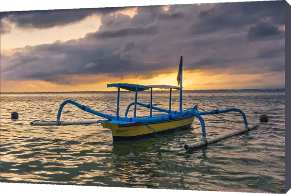 Sanur, Denpasar, Bali, Indonesia. Traditional jukung (fishing boat) at Sanur Beach