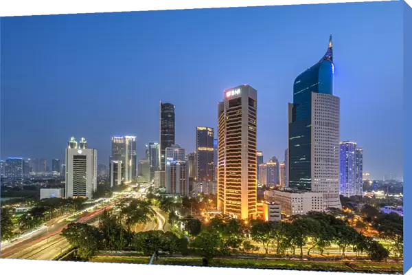 Financial district skyline at night, Jakarta, Java, Indonesia
