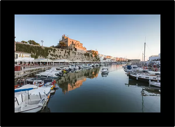 Historic harbour waterfront and town hall at sunset, Ciutadella, Menorca, Balearic