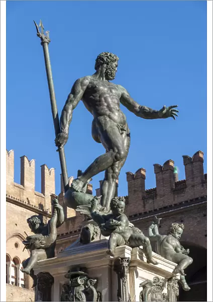 Statue of Neptune against blue sky, Piazza Maggiore, Bologna, Emilia Romagna, Italy