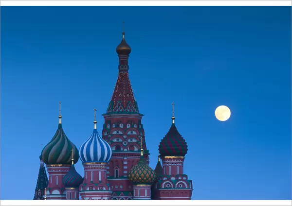 Russia, Moscow, Red Square, Kremlin, St. Basils Cathedral with moonrise