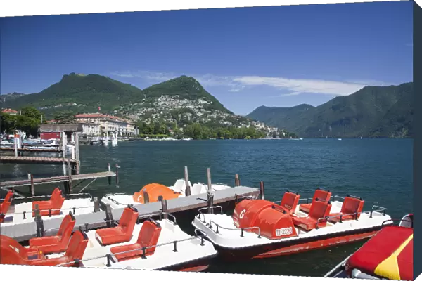 Switzerland, Ticino, Lake Lugano, Lugano, lakefront with paddleboats