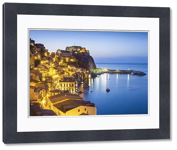 Town View at dusk, with Castello Ruffo, Scilla, Calabria, Italy