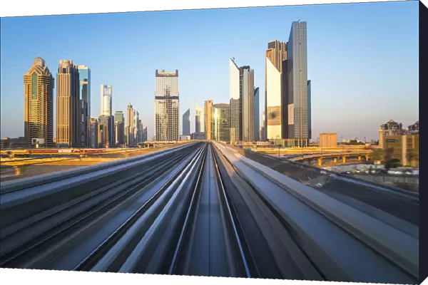 POV on the modern driverless Dubai elevated Rail Metro System, running alongside the