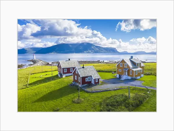 Aerial view of traditional houses and Hogsteinen Lighthouse, Godoya Island, Alesund
