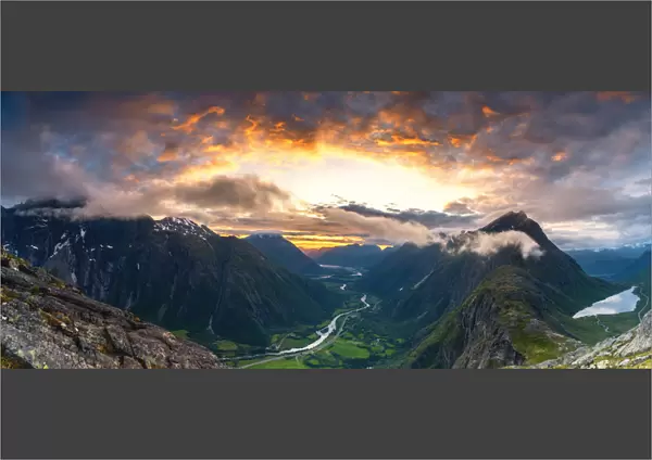 Sunset over the majestic Troll Wall and Venjesdalen mountain seen from Romsdalseggen