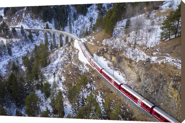 Aerial view of the famous Bernina Express passing over the Landwasser Viaduct