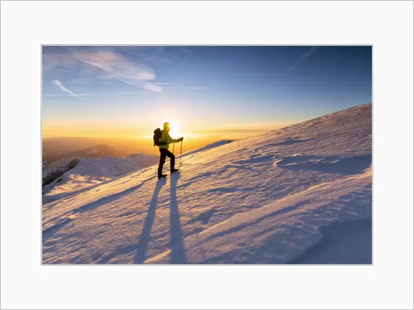 Hiker in Brescia prealpi at dawn, Monte Guglielmo, Brescia provinc, Lombardy District