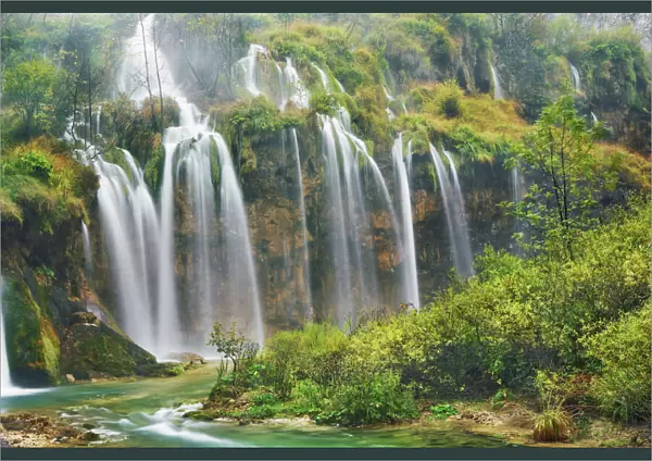 Waterfall in autumnal deciduous forest - Croatia, Lika-Senj