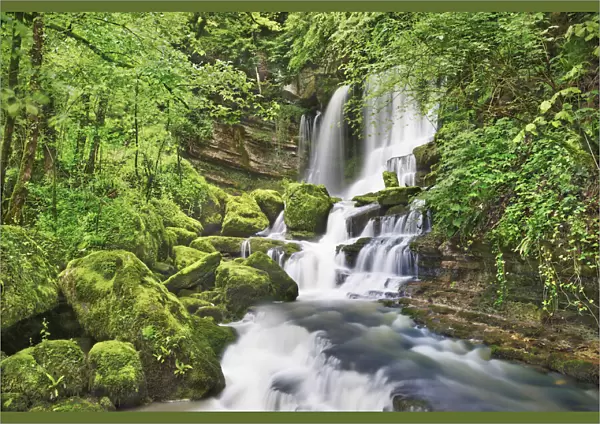 Waterfall in beech forest - France, Bourgogne-Franche-Comte, Doubs, Besancon