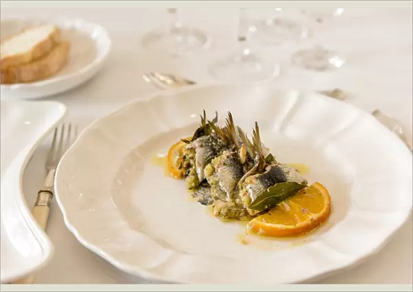 europe, Italy, Sicily. Palermo, a place setting with the Sarde Beccafico, a traditional local dish