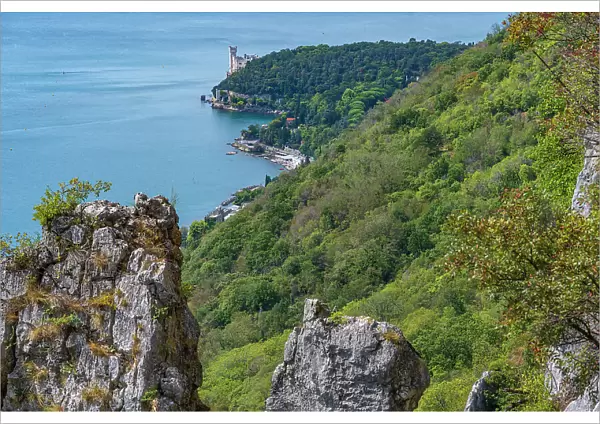 Italy, Friuli Venezia Giulia. View from the hiking path downwards to the castle of Miramare near to Triest