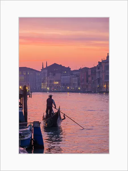 Sunset and gondolas on the Grand Canal, Venice, Veneto, Italy