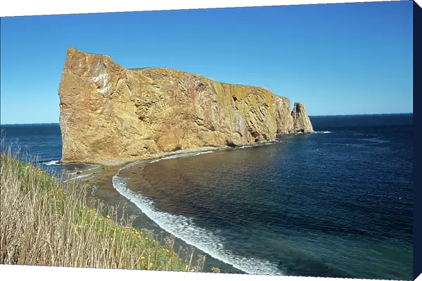 Rocher perce (Perce Rock) on the Gaspe Peninsula and the Atlantic Ocean Perce, Quebec, Canada