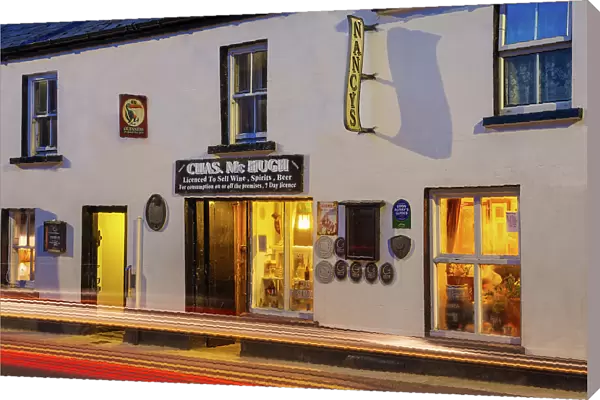 Ireland, Co. Donegal, Ardara, Nancys bar at night