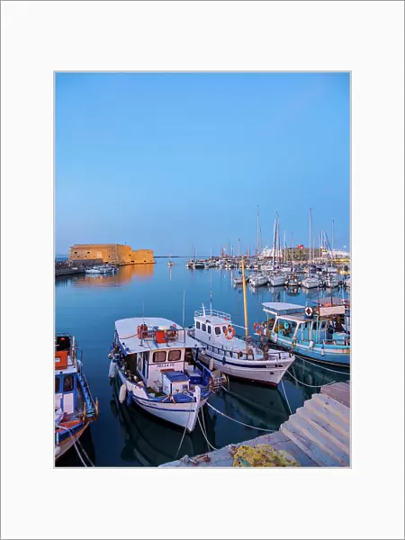 Old Venetian Port and The Koules Fortress at dusk, City of Heraklion, Crete, Greece