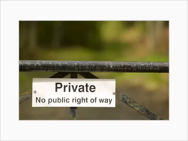 A private sign on a gate