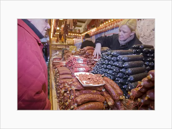 German sausages on a stall at the Christmas market outside Manchester Town Hall in Manchester UK