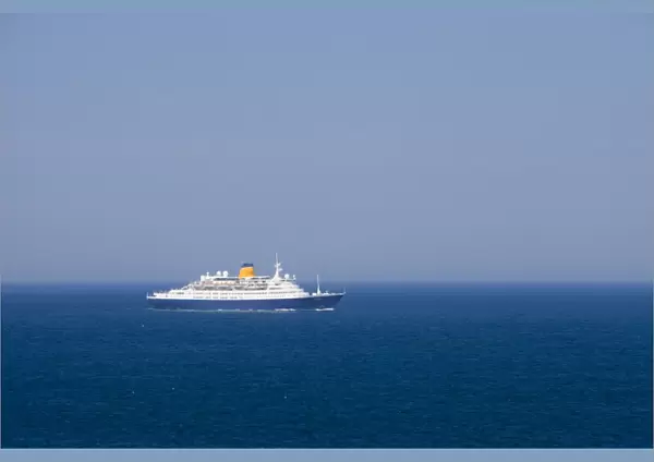 A cruise ship off Pendeen on the Cornish coast, UK