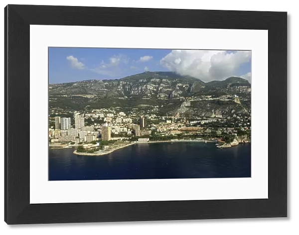 20038710. MONACO Cote d Azur Monte Carlo Aerial view from the sea toward the coastal city