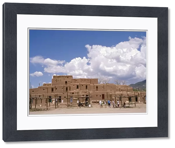 20065173. USA Colorado Taos Pueblo Inhabited historical dwellings with tourists outside