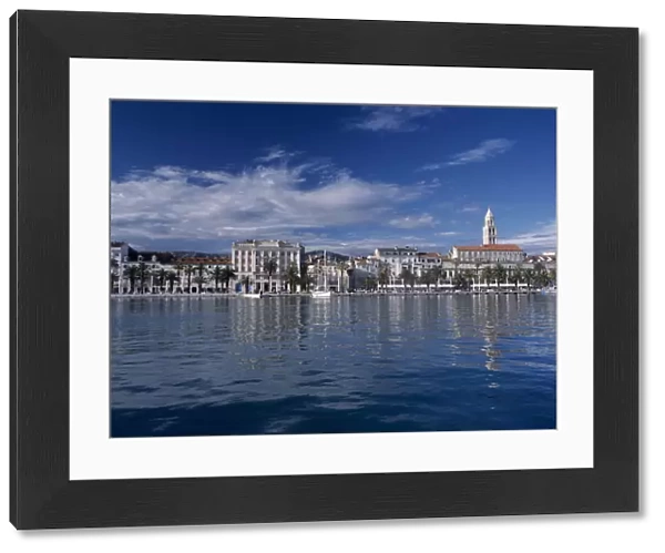 CROATIA, Dalmatia, Split Harbour and waterfront with St Domnius Cathedral spire behind