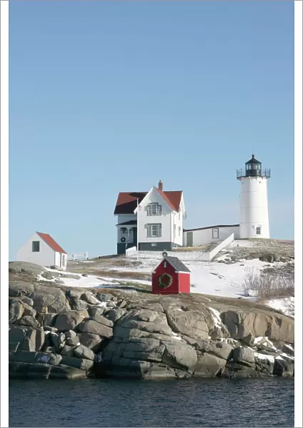 USA, Maine, York, Nubble Light lighthouse, Winter, Atlantic Ocean