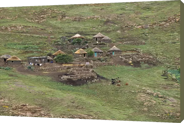 10095590. LESOTHO Near Katse Basotho Homesteads on hillside