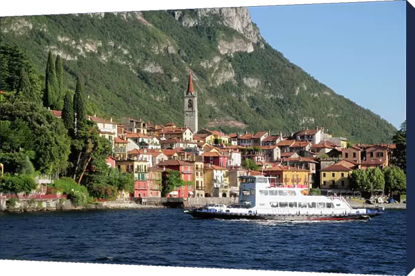 Italy, Lombardy, Lake Como, Varenna with ferry passing