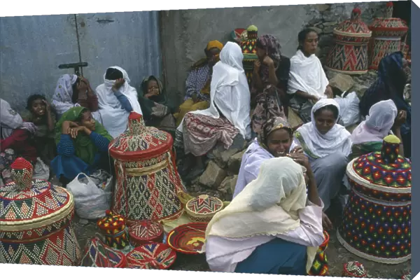 20066195. ETHIOPIA Gonder Women selling colourful woven baskets at market. Colorful Gondar
