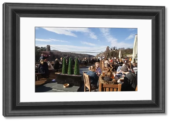 England, Bristol, Drinkers on the terrace of the White Lion Bar with a view of the