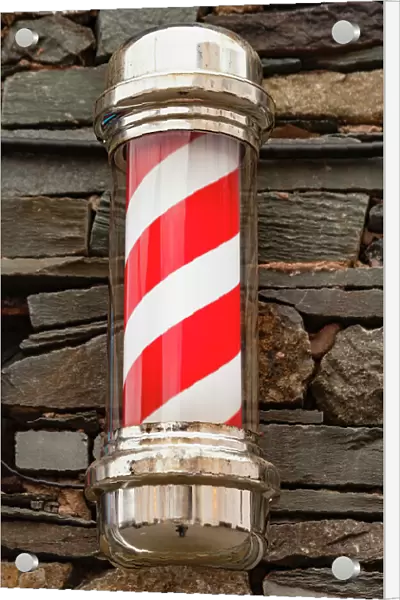 England, Cumbria, Keswick, Barbers pole, barbers shop sign