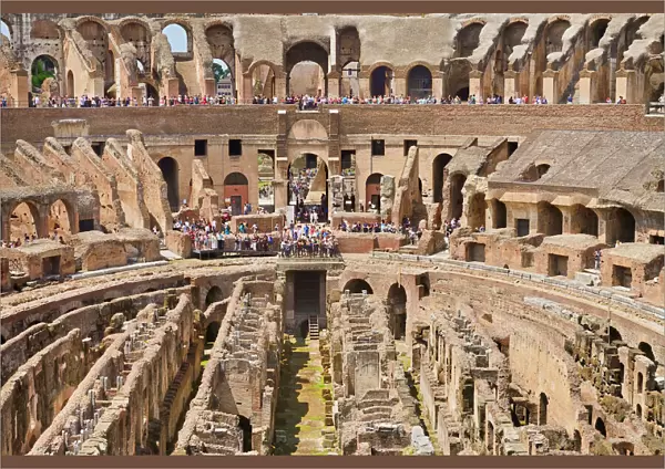 Italy, Rome, The Colosseum amphitheatre built by Emperor Vespasian in AD 80 with the interior thronged with tourists