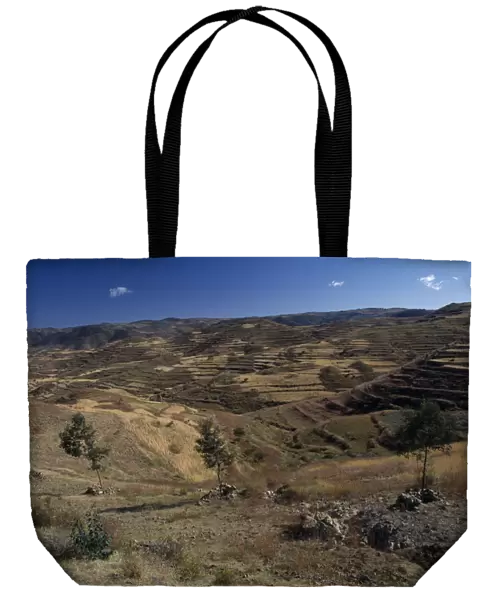 20070817. ERITREA Landscape Terraced hillsides and country road between Asmara and Keren